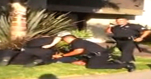 Los Angeles police beat a boy for skateboarding on the wrong side of the street (VIDEO)