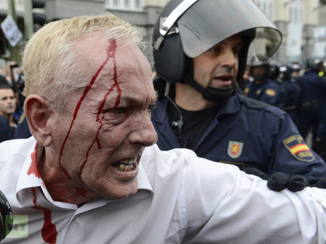 ‘Democracy kidnapped!’ Madrid police fire rubber bullets as thousands surround Spanish Congress