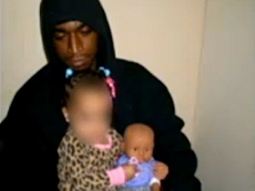 Man arrested for posing with baby and BB gun on Facebook photo