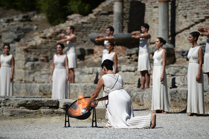 Sochi 2014 Flame lit in Olympia kicking off record-breaking torch relay